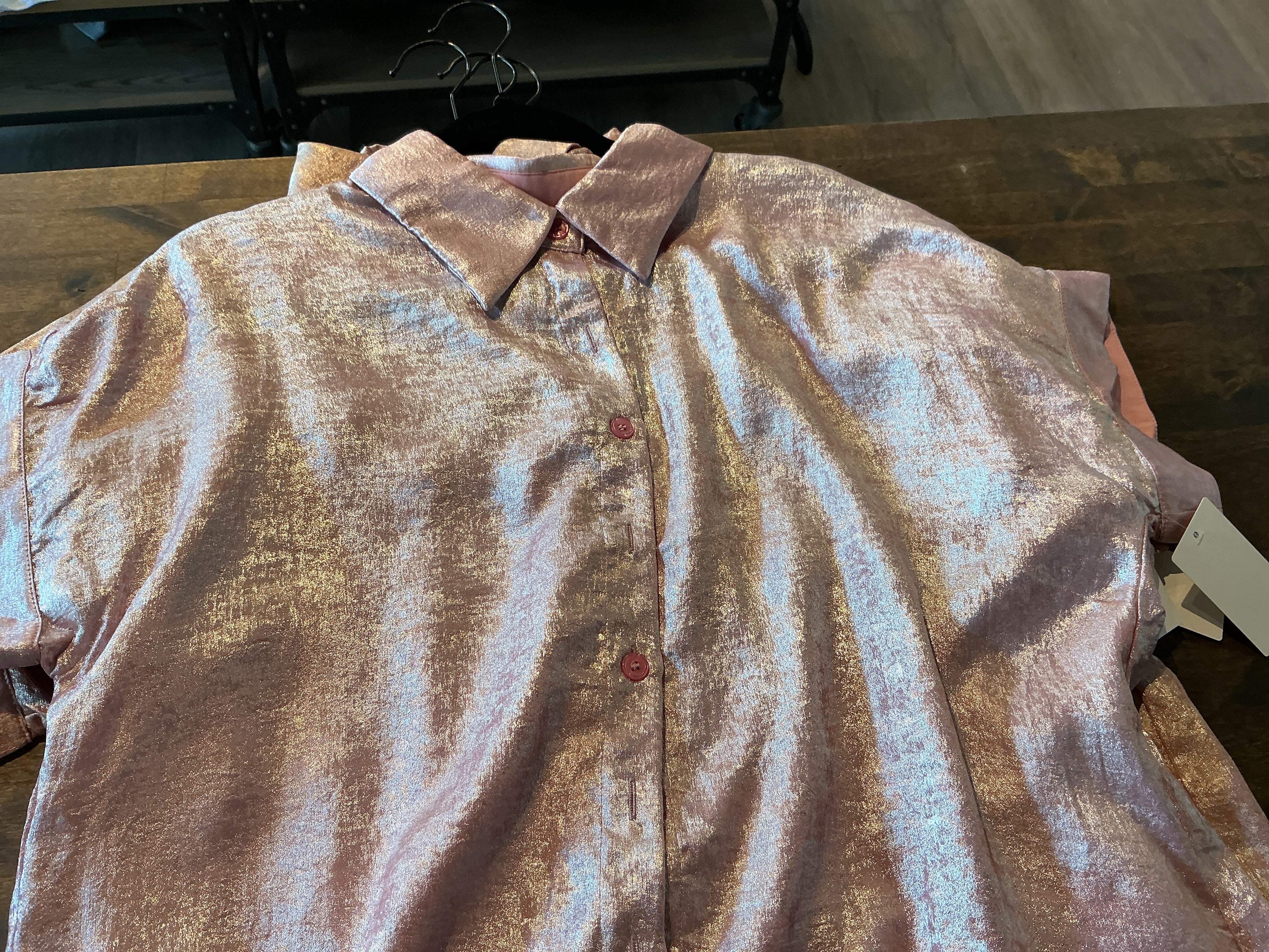 Light pink metallic short sleeve buttoned front blouse