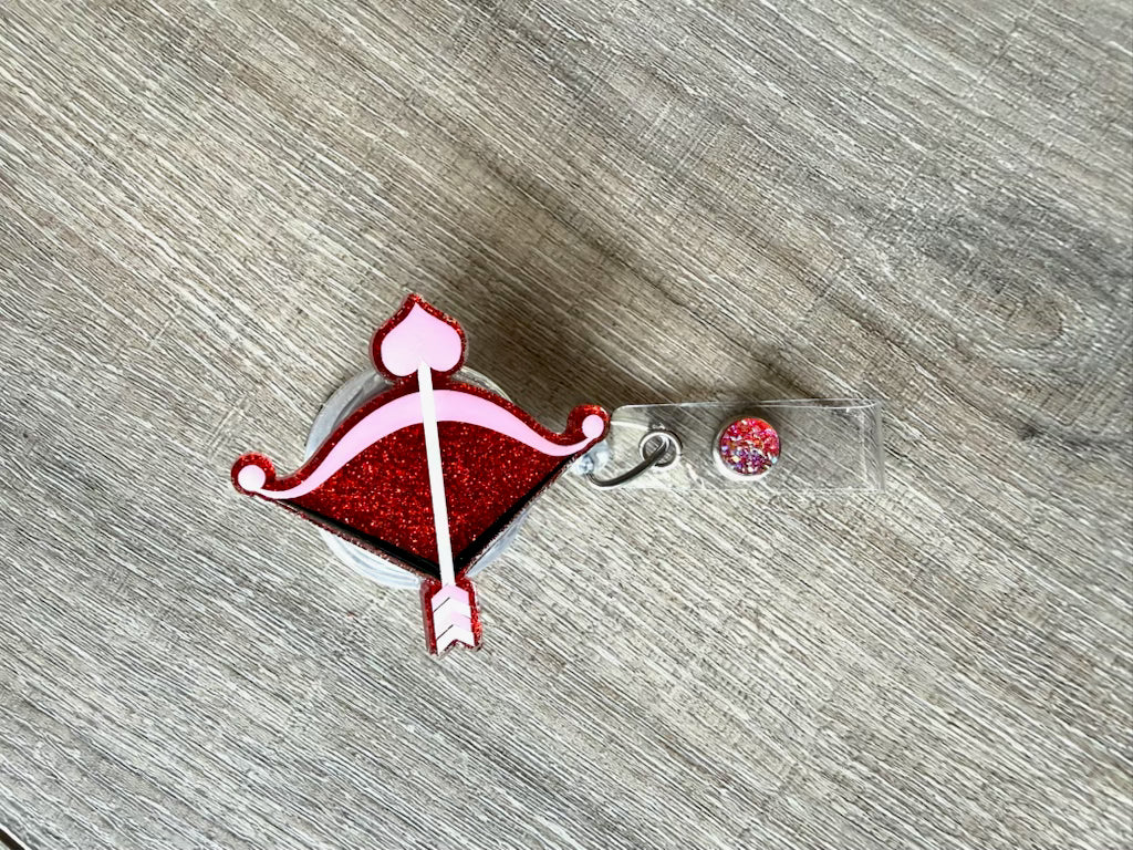 Cupid’s Arrow (Red) Badge Reel