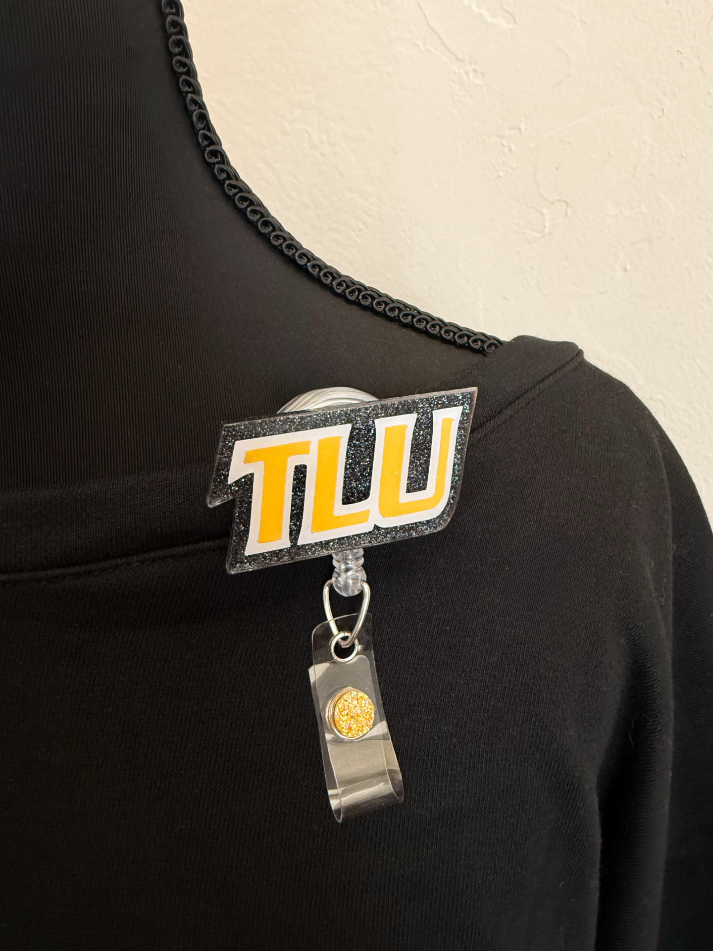 TLU Badge Reel