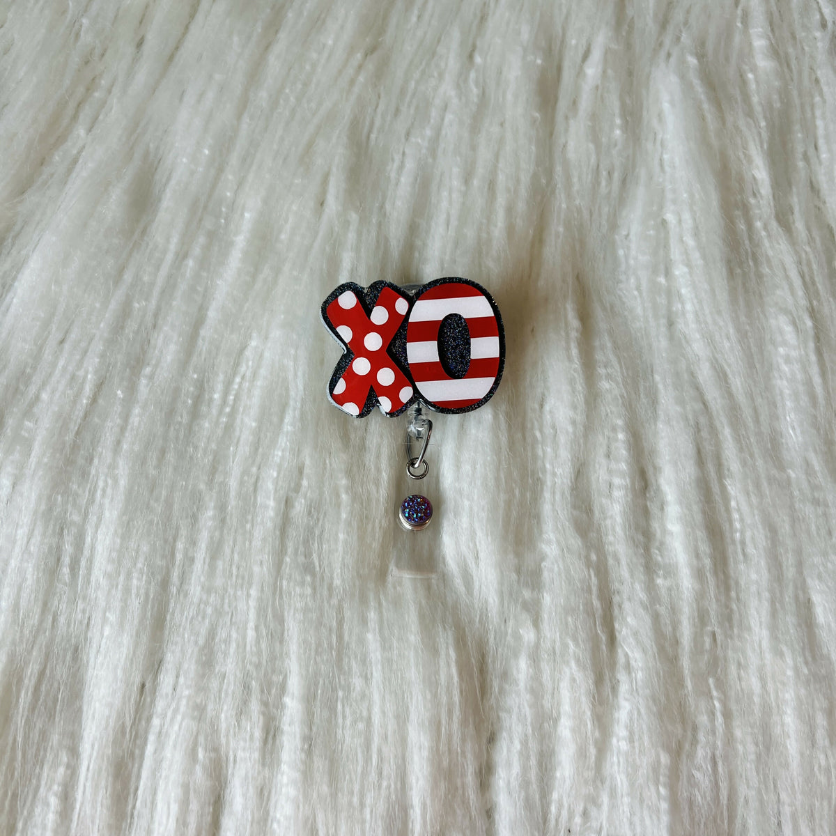 Red & White XO Badge Reel