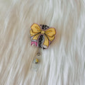 Pencil Bow Badge Reel