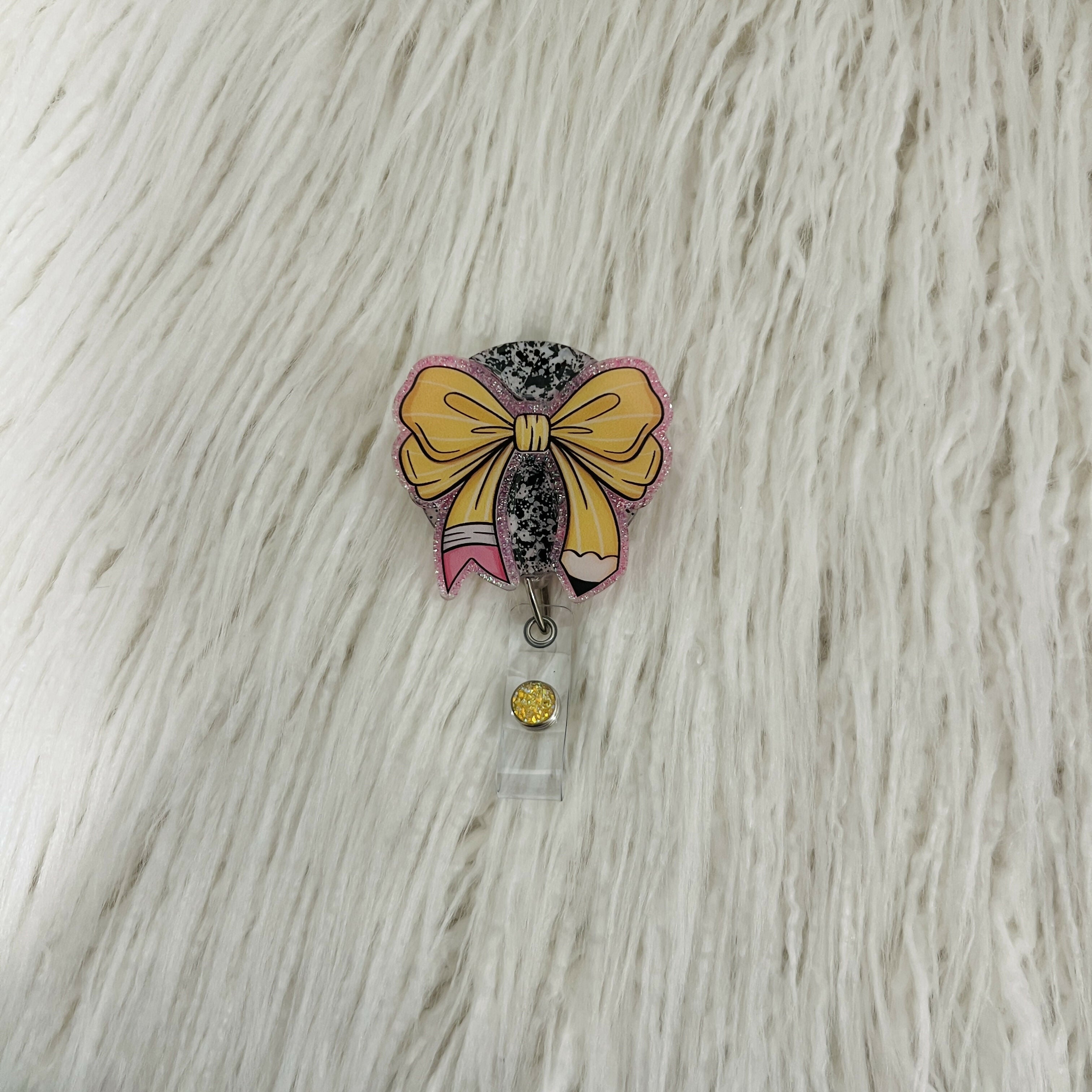 Pencil Bow Badge Reel